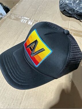 Black Trucker Hat with Colorful 'N' Patch